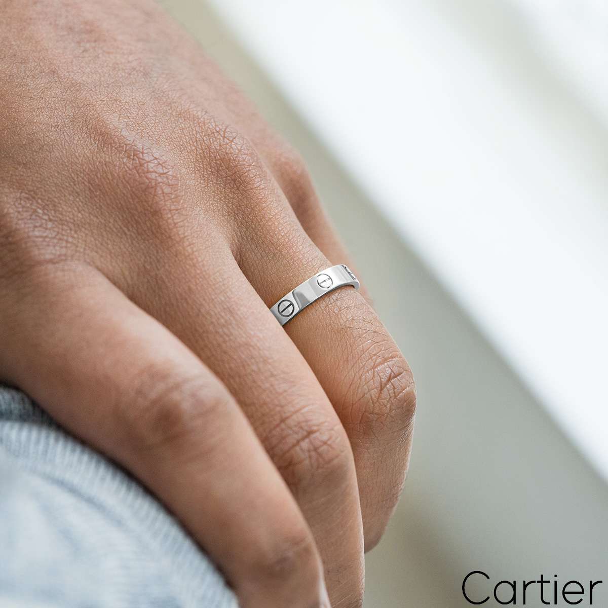 Shop Cartier LOVE Love wedding band (B4085100, B4085200, B4085000